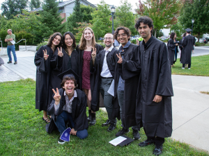 Williams seniors pose in their caps and gowns.