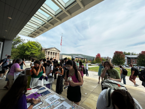 A photo of EphVotes volunteers assisting students with voter registration outside the Paresky Center in September 2024.